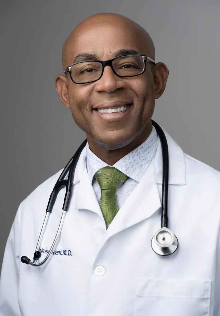 Dr. Claude Alain Innocent